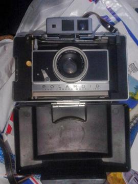 Camara y filmadora antigua Polaroid y Canon Antiguos