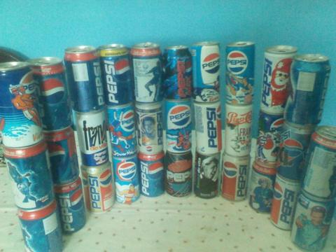 Se vende 32 latas de colección de PEPSI,, antiguas,,vacías