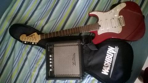 Guitarra electrica Whasburn con amplificador de 15 watts