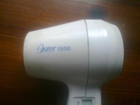 secar portatil marca oster barato