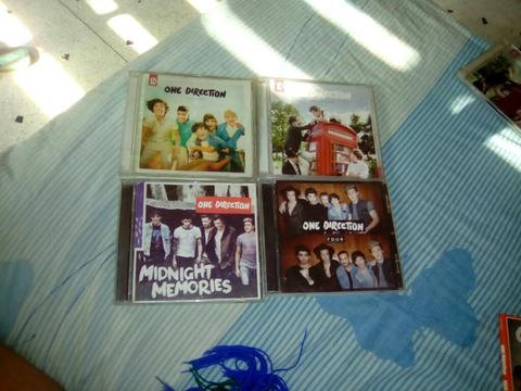 4 Albumes de One Direction en Buenas con