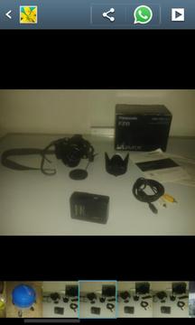 Camara Panasonic/ Trípode Profesional