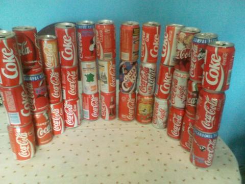 Se vende 36 latas de colección de COCACOLA,, antiguas,,vacías